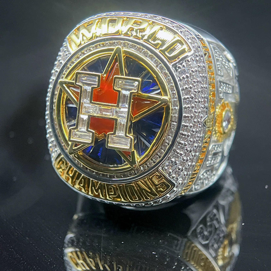 World Champions ring with star design on a dark background