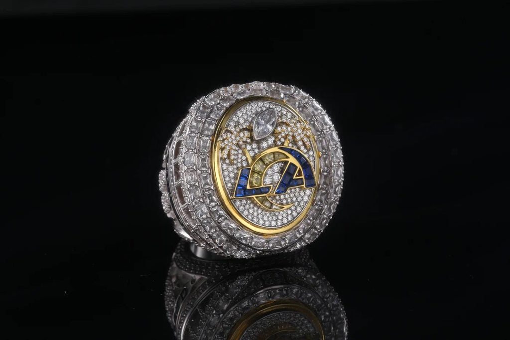 Luxury sports team championship ring with 'LA' logo on a black background