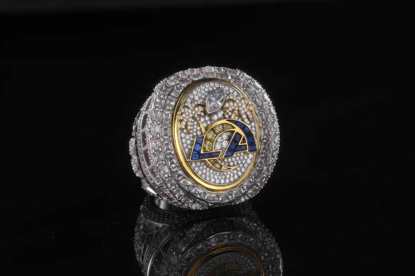 Luxury sports team championship ring with 'LA' logo on a black background