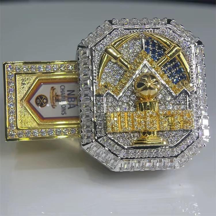 Luxury sports championship ring with NBA Champions logo