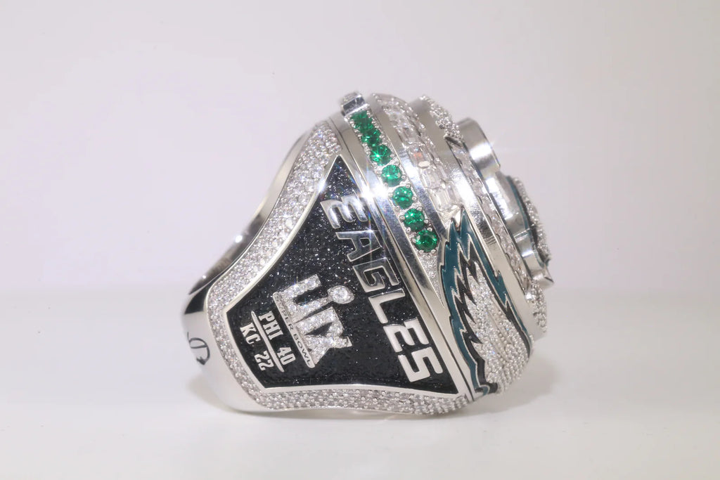 Silver championship ring with 'Eagles' and 'LIX' text on a white background
