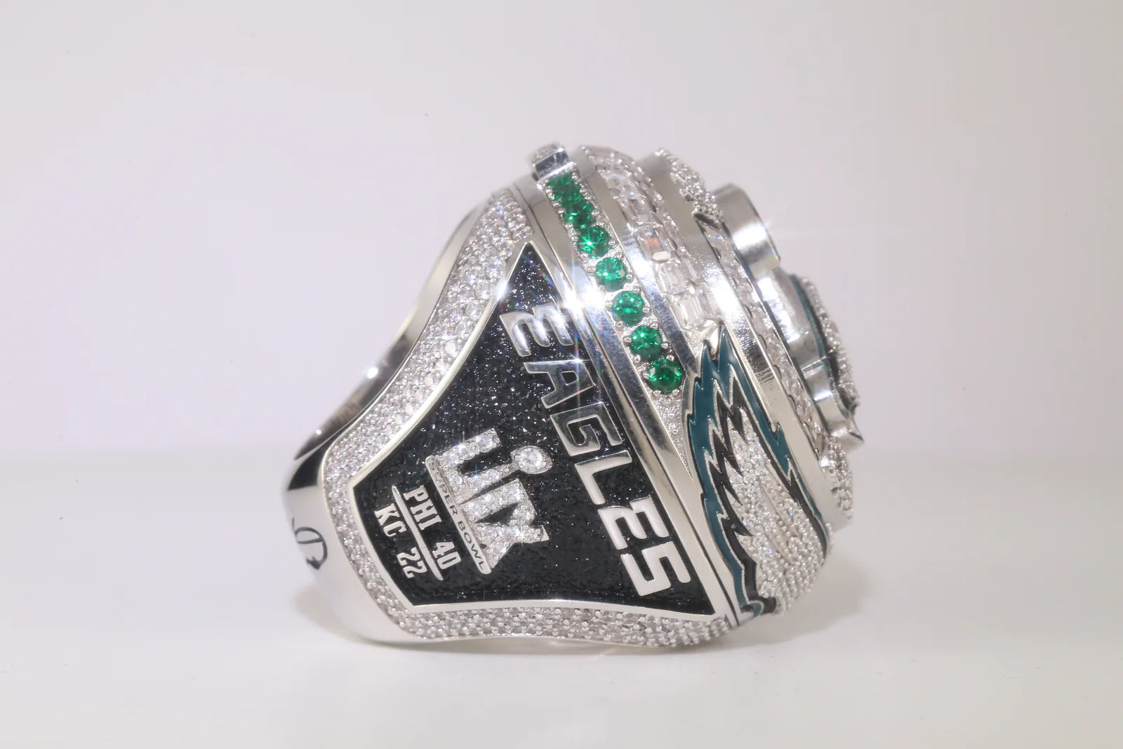 Silver championship ring with 'Eagles' and 'LIX' text on a white background