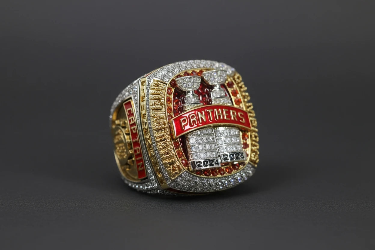Gold and silver championship ring with 'PANTHERS' and '2024' and '2025' text on a dark background
