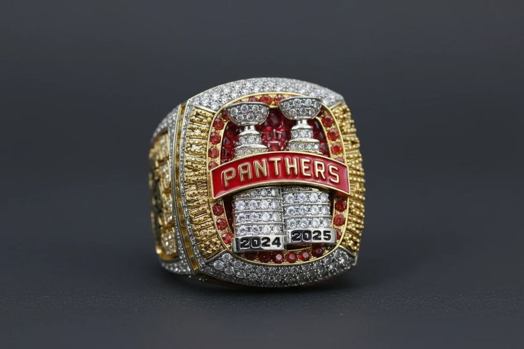 Gold and silver championship ring with 'PANTHERS' and '2024' and '2025' on a dark background