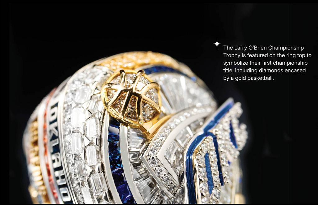 Close-up of a championship ring with detailed design and text on a black background